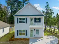 9385 Night Harbor Drive SE, Leland, NC 28451 — 3-bedroom home, Leland, NC, photo 1 of 32: Home Front
