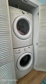 801 Ocean Drive, Emerald Isle, NC 28594 — 4-bedroom waterfront home, Emerald Isle, NC, photo 15 of 32: 15 Laundry closet