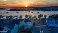 110 Waynick Boulevard, Wrightsville Beach, NC 28480 — 4-bedroom waterfront home, Wrightsville Beach, NC, photo 4 of 77: 002_dji_20260504195308_0453_d-hdr_copy_2
