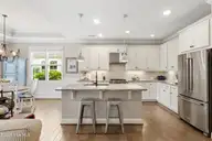 3014 Pine Bloom Way, Leland, NC 28451 — 4-bedroom home in Brunswick Forest, Leland, NC, photo 14 of 69: Large island with pendant lights
