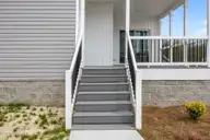 2246 Blackhawk Drive, Farmville, NC 27828 — 3-bedroom home in Chinquapin Road, Farmville, NC, photo 5 of 45: Covered Porch w/ Composite Decking