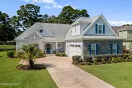 141 Clubhouse Road, Sunset Beach, NC 28468 — 4-bedroom home in Sea Trail Plantation, Sunset Beach, NC, photo 2 of 59: Front of House
