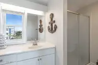 1509 Ocean Drive West, Emerald Isle, NC 28594 — 4-bedroom waterfront townhome in Emerald Isle By The Sea, Emerald Isle, NC, photo 15 of 26: 2 Seas the Day West 028 king with bath a