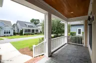 402 Cornubia Drive, Castle Hayne, NC 28429 — 3-bedroom home in River Bluffs, Castle Hayne, NC, photo 3 of 77: Cornubia402-2fprchShaneL33A4559 copy - C