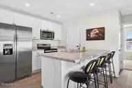 3834 Lady Bug Drive, Shallotte, NC 28470 — 2-bedroom home in Wildwood Village, Shallotte, NC, photo 11 of 19: Kitchen