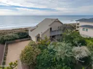 111 Dogwood Circle, Pine Knoll Shores, NC 28512 — 4-bedroom waterfront home in Pine Knoll Association, Pine Knoll Shores, NC, photo 1 of 52: 111 Dogwood Circle