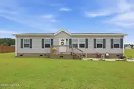 203 Magnolia Drive, Stella, NC 28582 — 3-bedroom manufactured home in Stella Farms, Stella, NC, photo 1 of 40: 1-web-or-mls-IMG_3328