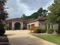 202 Elijah Court, Wilmington, NC 28412 — 3-bedroom waterfront home in Village at Motts Landing, Wilmington, NC, photo 1 of 2