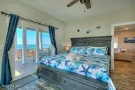 5103 W Beach Drive, Oak Island, NC 28465 — 4-bedroom waterfront home in W. Long Beach, Oak Island, NC, photo 21 of 65: 5103 W Beach Drive 20