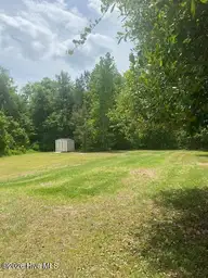 1951 Stanley Road SW, Supply, NC 28462 — 4-bedroom manufactured home, Supply, NC, photo 24 of 27: Backyard 2