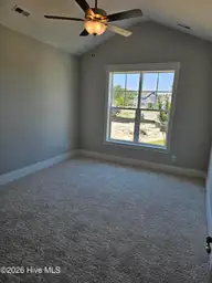 371 Longhill Drive, Wilmington, NC 28412 — 3-bedroom home in Riverlights, Wilmington, NC, photo 13 of 16: Guest Bed