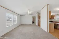 124 Zack Circle, Elizabeth City, NC 27909 — 3-bedroom manufactured home in Red Oak, Elizabeth City, NC, photo 4 of 36: Living Room