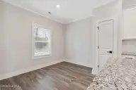 210 S Umbrella Palm Drive, Hampstead, NC 28443 — 3-bedroom home in Southwater Village, Hampstead, NC, photo 9 of 17: Southeast_Blanco_L_010