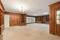 209 Brentwood Drive N, Wilson, NC 27893 — 4-bedroom home in Brentwood Forest, Wilson, NC, photo 21 of 60: Den