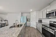 5231 Soy Bean Drive NE, Winnabow, NC 28479 — 5-bedroom home in Country Walk, Winnabow, NC, photo 17 of 57: 31_kitchen