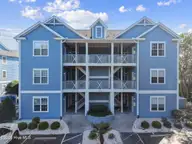 2555 St James Drive SE Unit 101, Southport, NC 28461 — 3-bedroom condo in St James, Southport, NC, photo 2 of 53: Front View