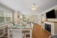 308 Live Oak Street, Emerald Isle, NC 28594 — 4-bedroom waterfront home in Ocean Forest, Emerald Isle, NC, photo 11 of 68: Dining Area to Living Area
