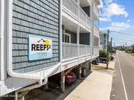1308 Carolina Beach Avenue N Apt 2c, Carolina Beach, NC 28428 — 3-bedroom waterfront condo in Reefs, Carolina Beach, NC, photo 3 of 34: 13-print-22-print-DJI_0403