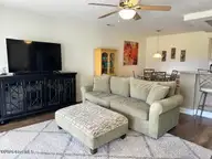330 S Middleton Drive NW Unit 505, Calabash, NC 28467 — 2-bedroom waterfront condo in Brunswick Plantation, Calabash, NC, photo 20 of 72: 505 living room 1 - Copy - Copy