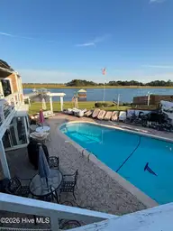 8120 Bald Eagle Lane, Wilmington, NC 28411 — 3-bedroom waterfront home in Porters Neck Plantation, Wilmington, NC, photo 1 of 7: Back Yard