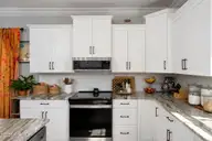 541 Moss Lake Lane, Holly Ridge, NC 28445 — 4-bedroom home in Summerhouse On Everett Bay, Holly Ridge, NC, photo 15 of 71: kitchen-01d