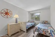 590 Marina Drive E-5, Pine Knoll Shores, NC 28512 — 3-bedroom waterfront condo in Beacon's Reach, Pine Knoll Shores, NC, photo 15 of 31: Bedroom 2