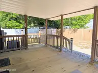 1984 River Street SW, Supply, NC 28462 — 3-bedroom manufactured home in Fishermans Village, Supply, NC, photo 20 of 37: Deck1