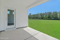 1727 Saucepan Bay Drive SW, Shallotte, NC 28470 — 3-bedroom home in Creekview Landing, Shallotte, NC, photo 24 of 38: View fron Lanai