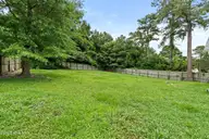153 Lawndale Lane, Sneads Ferry, NC 28460 — 3-bedroom home in Justice Farm, Sneads Ferry, NC, photo 22 of 23: Backyard
