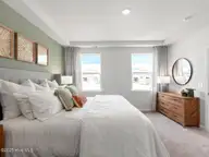 4246 Allsbrook Lane Unit 1011, Leland, NC 28451 — 3-bedroom townhome in Indigo Preserve, Leland, NC, photo 16 of 42: Primary Bedroom