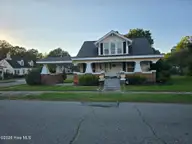 201 N Southerland Street, Mount Olive, NC 28365 — 3-bedroom home, Mount Olive, NC, photo 1 of 22: Primary Photo