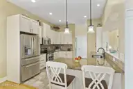 516 Blue Heron Drive, Newport, NC 28570 — 3-bedroom waterfront home in Blue Heron Bay, Newport, NC, photo 16 of 62: Kitchen with bar seating