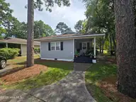 502 Wesley Avenue, Wilmington, NC 28403 — 3-bedroom home in Hillsdale, Wilmington, NC, photo 2 of 37: front porch from drive
