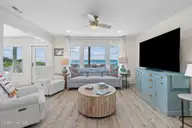 7803 Ocean Drive East, Emerald Isle, NC 28594 — 4-bedroom waterfront townhome, Emerald Isle, NC, photo 22 of 62: 7803_E_Ocean_Drive_#E_014_Living_Room