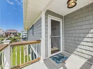 117 Salisbury Street, Holden Beach, NC 28462 — 3-bedroom waterfront home, Holden Beach, NC, photo 3 of 40: Front Porch