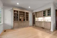 26 Cumberland Drive, Pinehurst, NC 28374 — 3-bedroom home in Forest Creek, Pinehurst, NC, photo 19 of 57: Wet Bar and Lounge Area