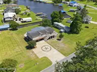 2831 Whichards Beach Road, Chocowinity, NC 27817 — 3-bedroom waterfront manufactured home in Portside, Chocowinity, NC, photo 2 of 53: 10-web-or-mls-DJI_20260602145039_0143_D