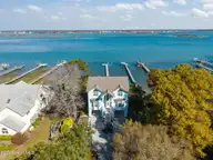 8722 Emerald Plantation Road, Emerald Isle, NC 28594 — 4-bedroom waterfront home in Emerald Plantation, Emerald Isle, NC, photo 1 of 63: 2-web-or-mls-DJI_20260331102606_0183_D