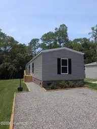 3527 Tarpon Court SE, Bolivia, NC 28422 — 3-bedroom waterfront manufactured home in River Run Plantation, Bolivia, NC, photo 1 of 29