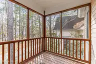 5022 Walton Street, Shallotte, NC 28470 — 2-bedroom home in The Village of Woodsong, Shallotte, NC, photo 24 of 38: Detached living screened porch