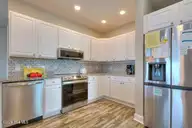 5103 W Beach Drive, Oak Island, NC 28465 — 4-bedroom waterfront home in W. Long Beach, Oak Island, NC, photo 16 of 65: 5103 W Beach Drive 15