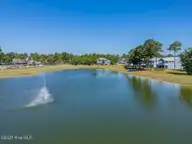 3586 Rivergate Way NE, Leland, NC 28451 — 4-bedroom waterfront home in The Bluffs on the Cape Fear, Leland, NC, photo 3 of 69: new drone 4