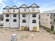 207 Shell Road 3a, Surf City, NC 28445 — 4-bedroom waterfront townhome in Dune Ridge, Surf City, NC, photo 4 of 71: 4_DJI_0295