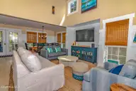 23 Ibis Roost, Bald Head Island, NC 28461 — 3-bedroom home in Ibis Roost, Bald Head Island, NC, photo 12 of 40: Living Room