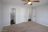 302 Paddock Place, Jacksonville, NC 28546 — 3-bedroom home in Horse Creek Farms, Jacksonville, NC, photo 9 of 16: masterbedroom