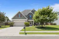 412 Cyrus Thompson Drive, Jacksonville, NC 28546 — 4-bedroom home in Towne Pointe, Jacksonville, NC, photo 1 of 44