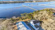 2509 Gator Lane SW, Supply, NC 28462 — 3-bedroom waterfront home in Gators Grant, Supply, NC, photo 2 of 56: DJI_20260319084035_0098_D