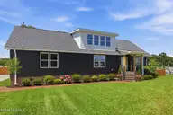 201 Mansfield Parkway, Morehead City, NC 28557 — 4-bedroom waterfront home in Morehead Bluffs, Morehead City, NC, photo 3 of 50: AI Exterior