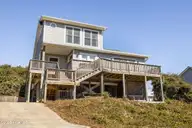 7122 Ocean Drive, Emerald Isle, NC 28594 — 4-bedroom waterfront home in Dogwood Acres, Emerald Isle, NC, photo 2 of 54: 5-web-or-mls-1S3A2989