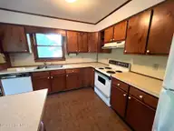 136 NE 21st Street, Oak Island, NC 28465 — 2-bedroom home in Tranquil Harbor, Oak Island, NC, photo 7 of 35